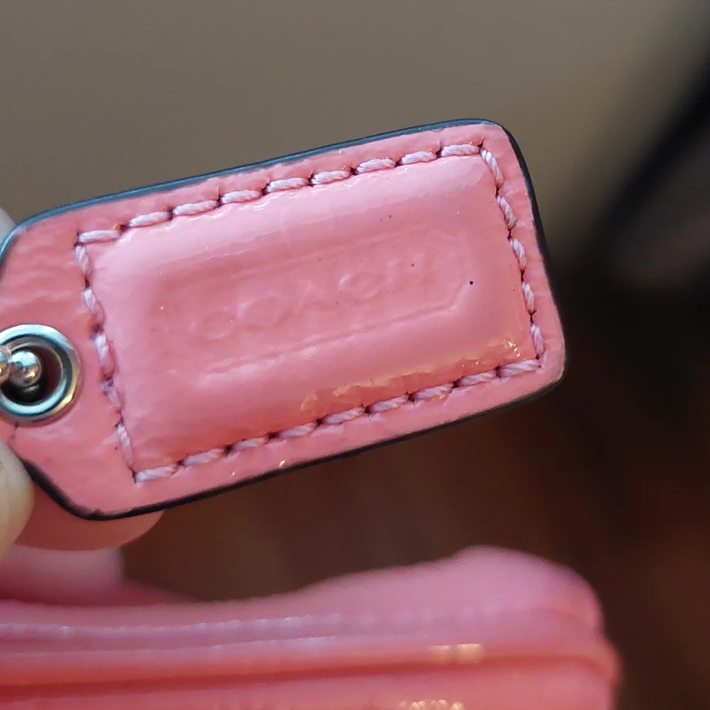 COACH Shiny Pebbled Leather Wristlet